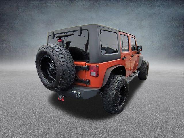 used 2011 Jeep Wrangler Unlimited car, priced at $13,970