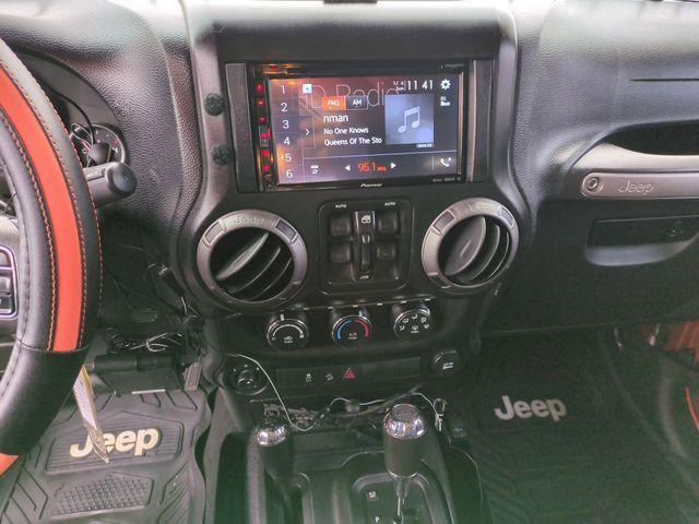 used 2011 Jeep Wrangler Unlimited car, priced at $13,970