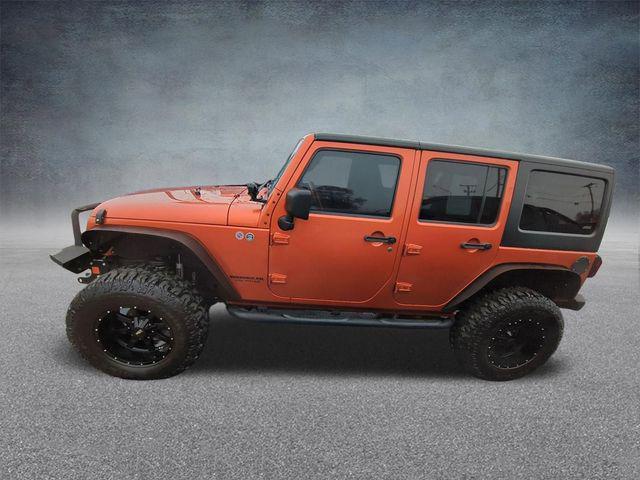 used 2011 Jeep Wrangler Unlimited car, priced at $13,970
