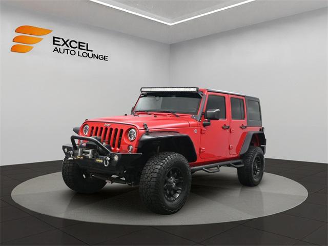 used 2015 Jeep Wrangler Unlimited car, priced at $18,990