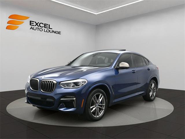 used 2021 BMW X4 car, priced at $25,626