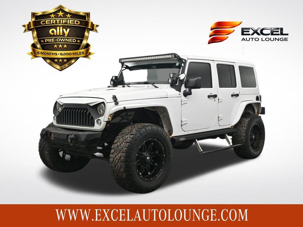 used 2014 Jeep Wrangler Unlimited car, priced at $14,873