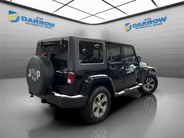 used 2016 Jeep Wrangler Unlimited car, priced at $18,028