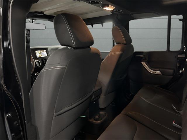 used 2016 Jeep Wrangler Unlimited car, priced at $18,028