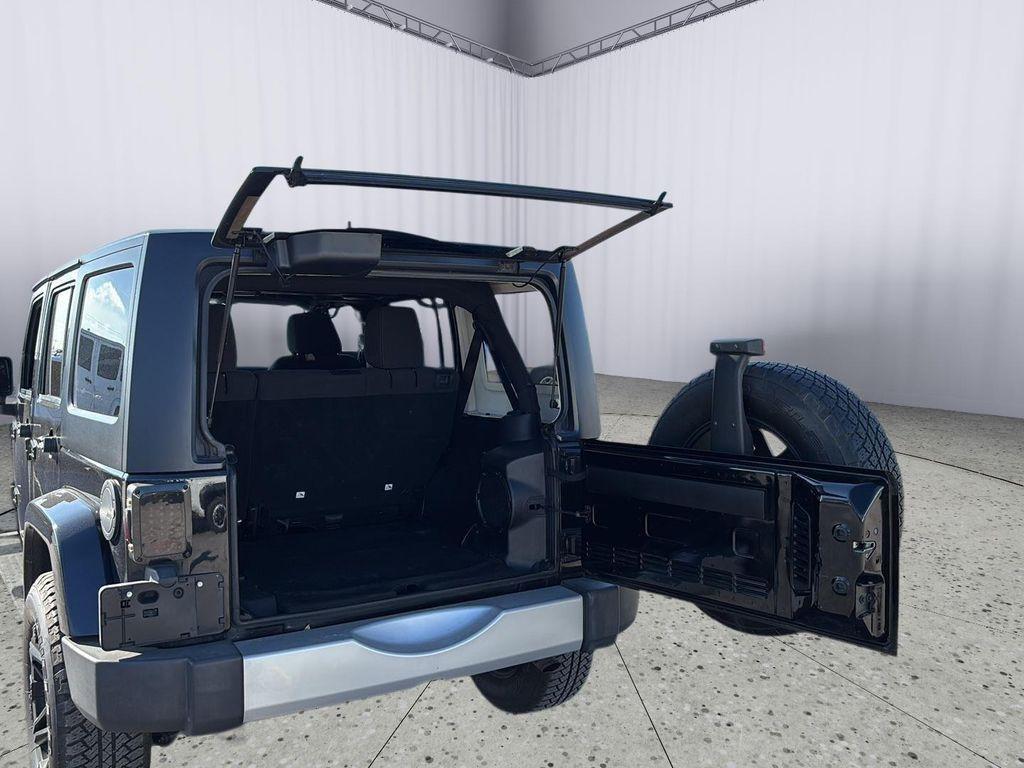 used 2013 Jeep Wrangler Unlimited car, priced at $13,900