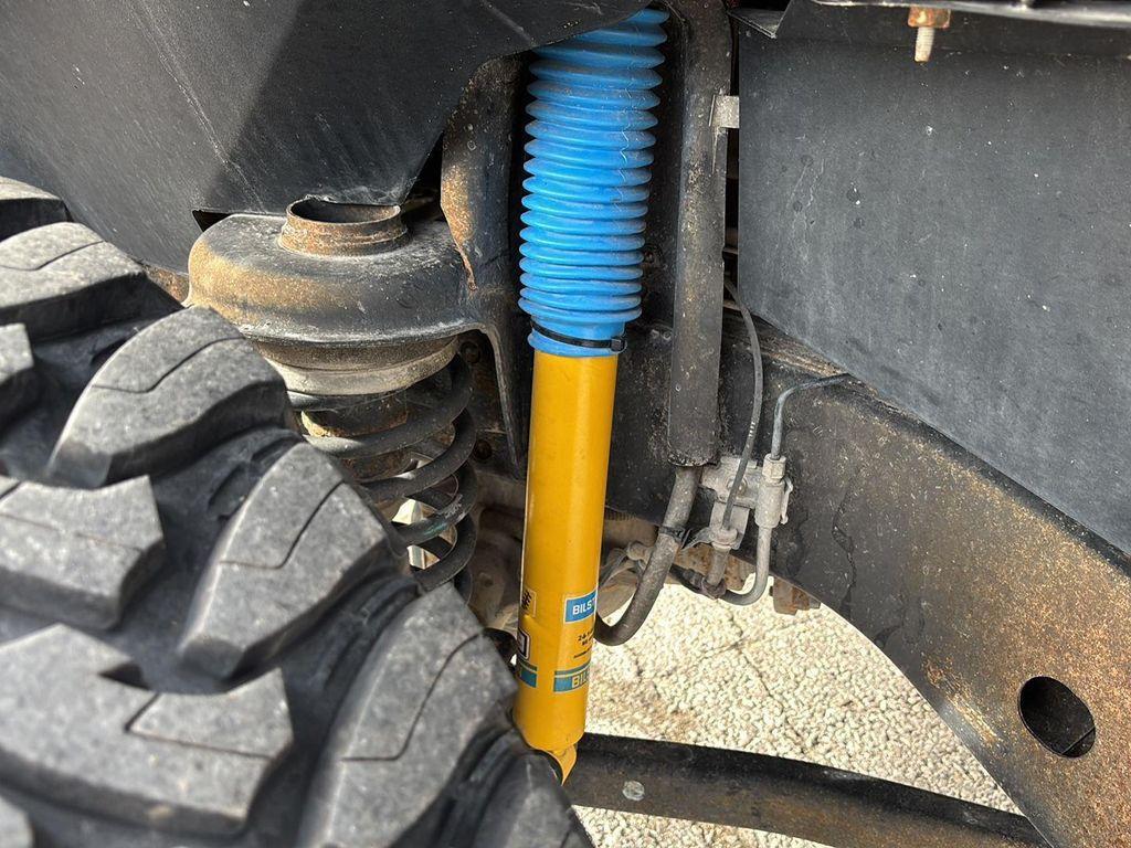 used 2013 Jeep Wrangler Unlimited car, priced at $15,900