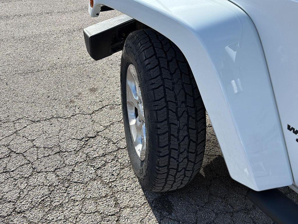 used 2014 Jeep Wrangler Unlimited car, priced at $20,900