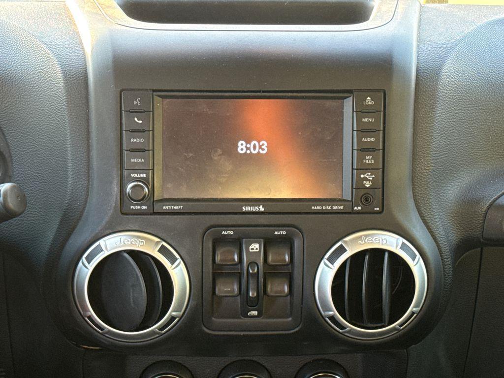 used 2016 Jeep Wrangler Unlimited car, priced at $22,213