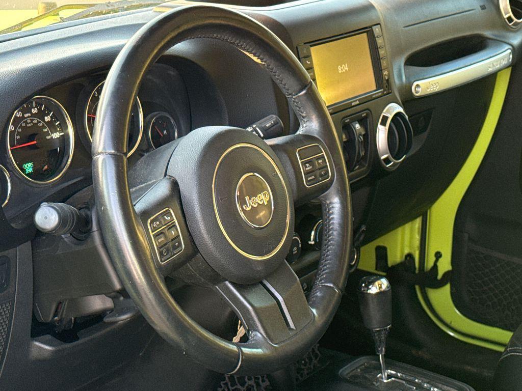 used 2016 Jeep Wrangler Unlimited car, priced at $22,213