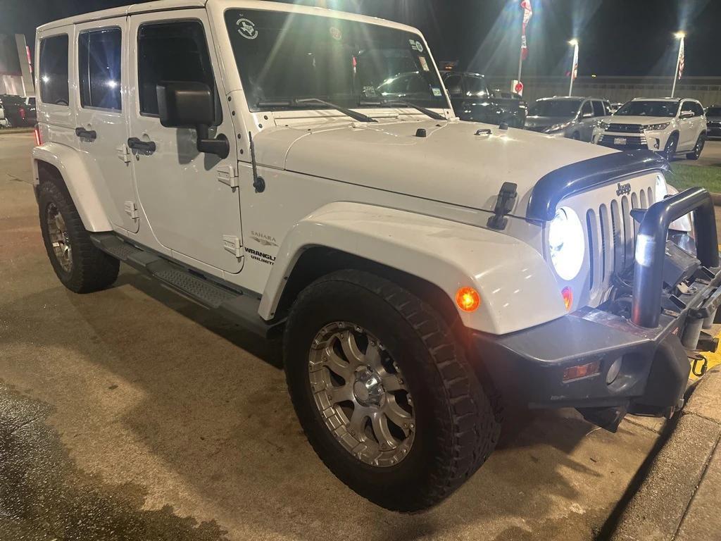 used 2012 Jeep Wrangler Unlimited car, priced at $12,891