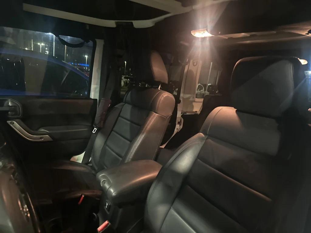 used 2012 Jeep Wrangler Unlimited car, priced at $12,891