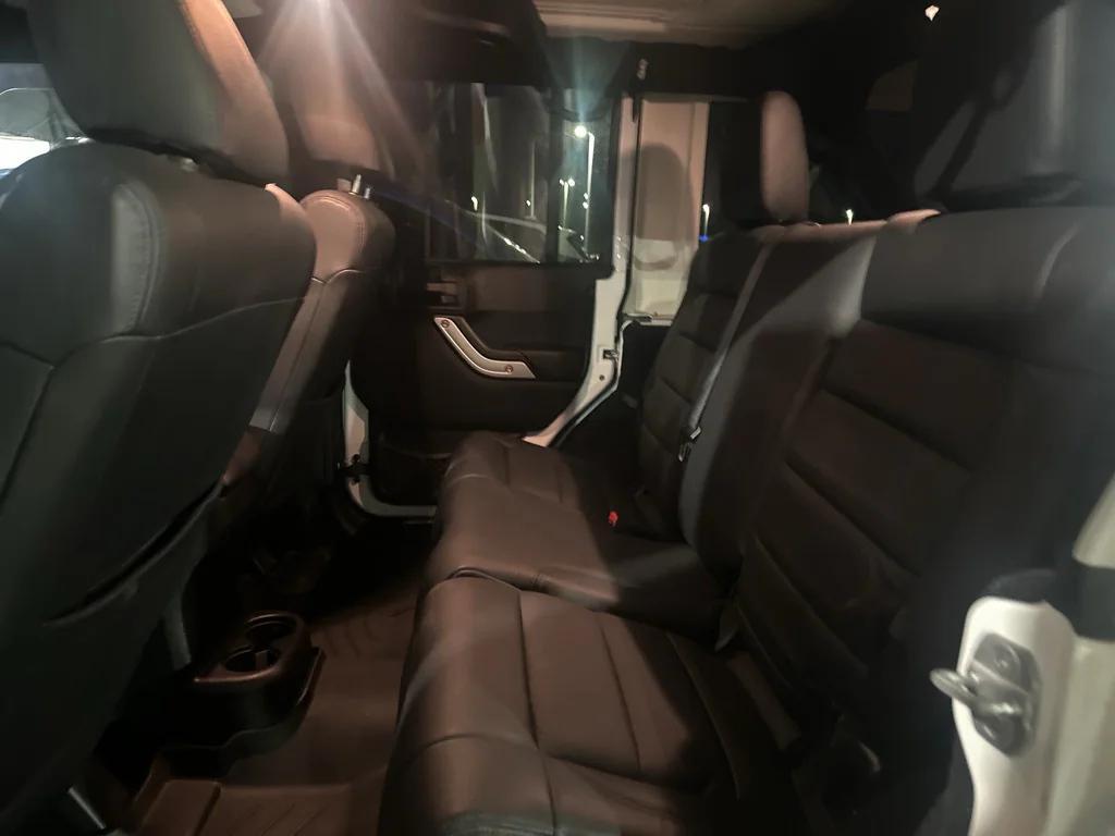 used 2012 Jeep Wrangler Unlimited car, priced at $12,891