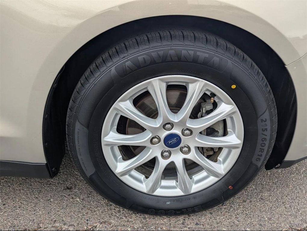 used 2015 Ford Fusion car, priced at $9,988