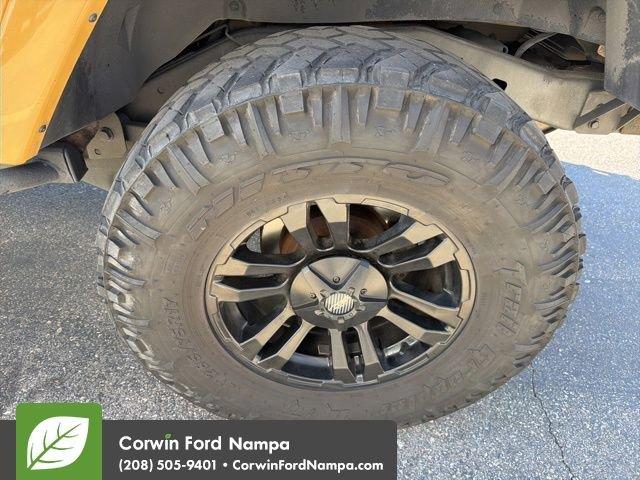 used 2014 Jeep Wrangler Unlimited car, priced at $16,989
