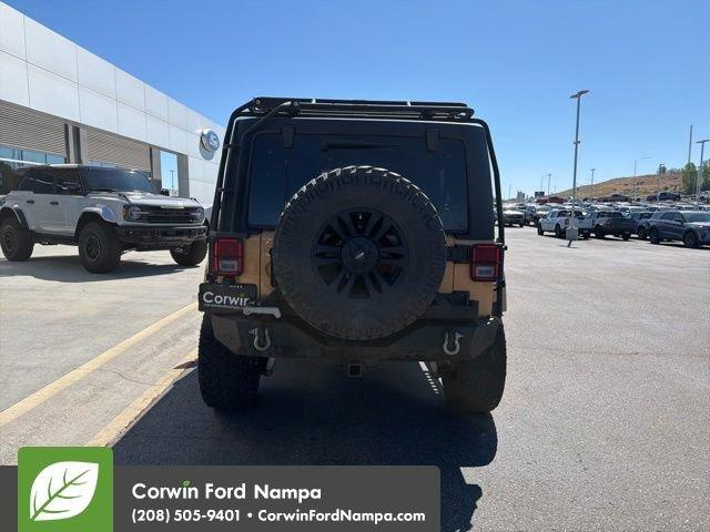 used 2014 Jeep Wrangler Unlimited car, priced at $16,989