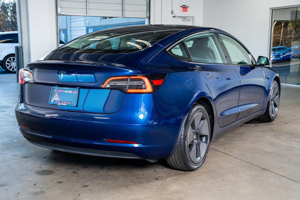 used 2023 Tesla Model 3 car, priced at $27,999