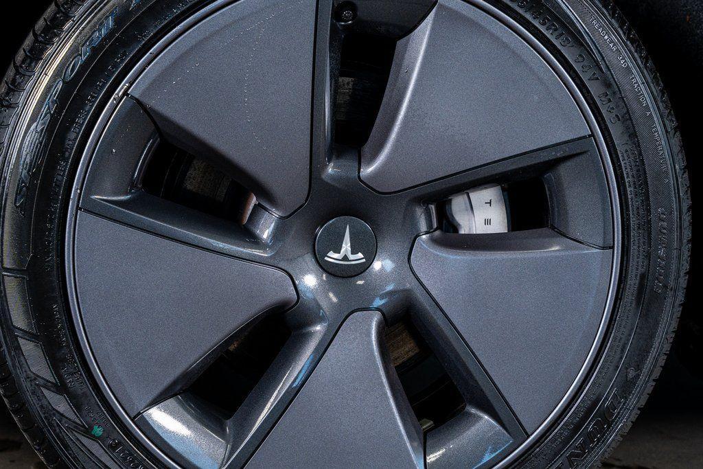 used 2023 Tesla Model 3 car, priced at $27,999