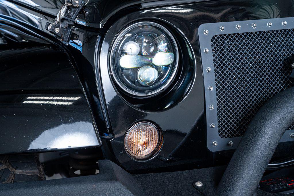 used 2014 Jeep Wrangler Unlimited car, priced at $22,499