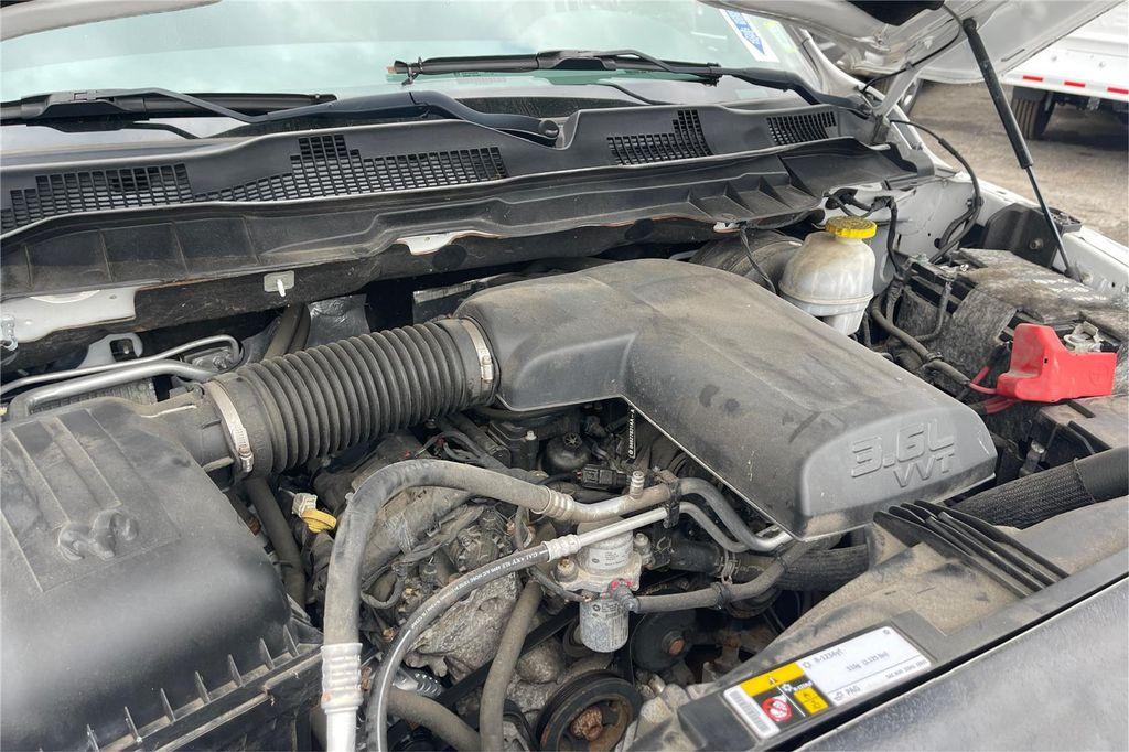 used 2018 Ram 1500 car, priced at $19,500