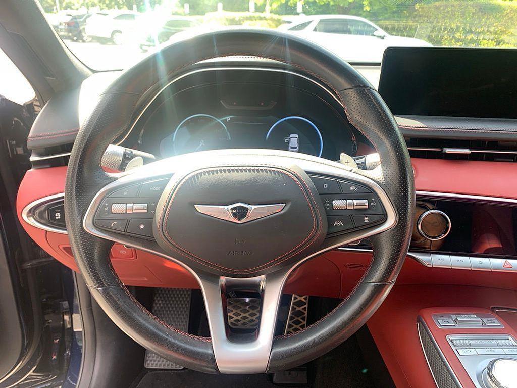 used 2023 Genesis GV70 car, priced at $38,495