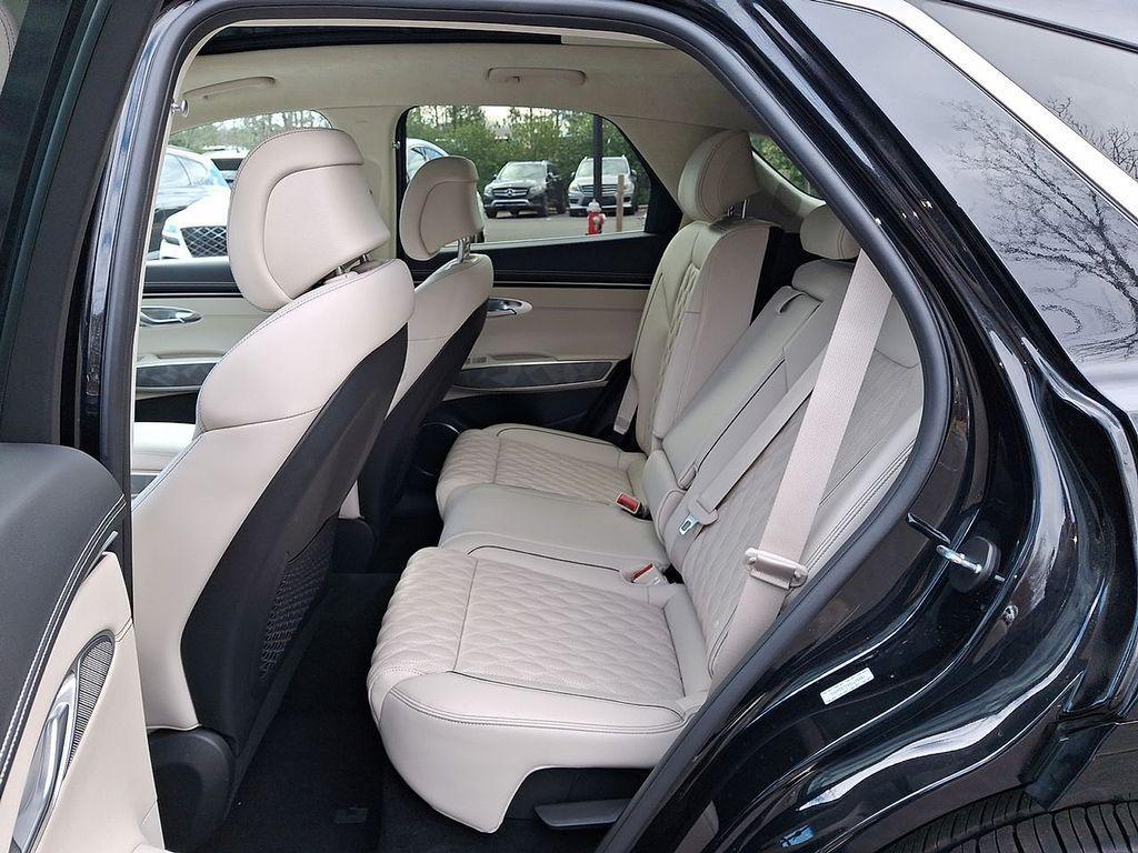 used 2025 Genesis GV70 car, priced at $50,498