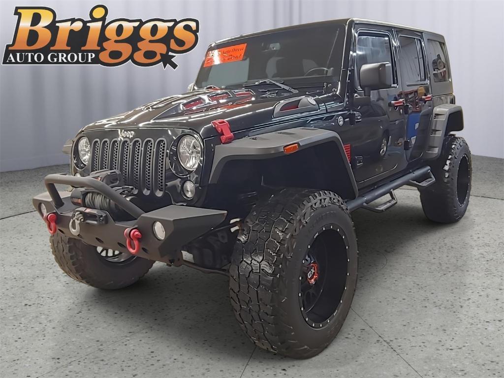 used 2014 Jeep Wrangler Unlimited car, priced at $19,200