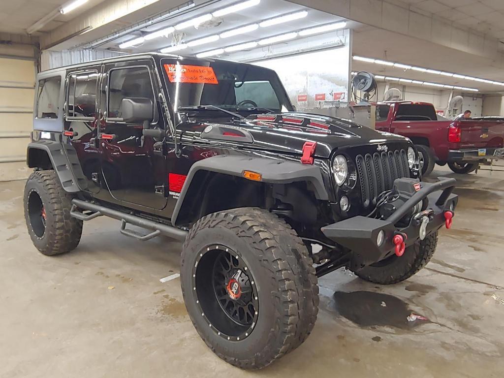 used 2014 Jeep Wrangler Unlimited car, priced at $19,200