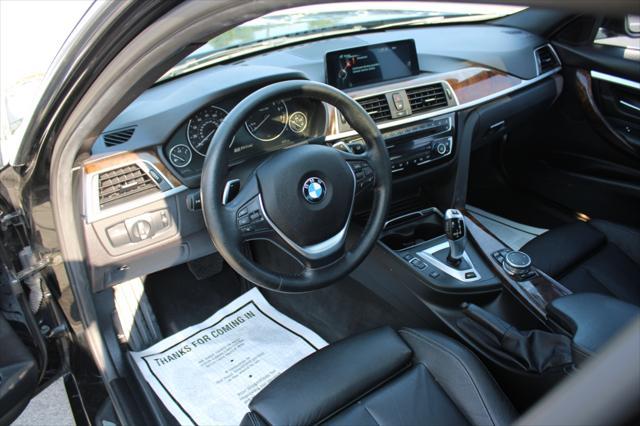 used 2016 BMW 330e car, priced at $12,990
