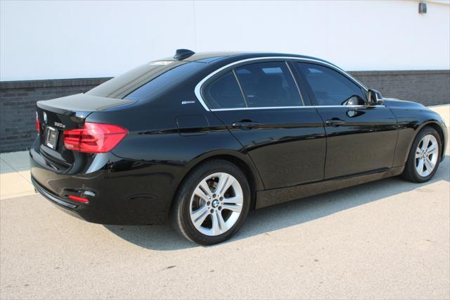used 2016 BMW 330e car, priced at $12,990