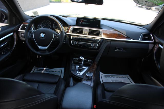used 2016 BMW 330e car, priced at $12,990