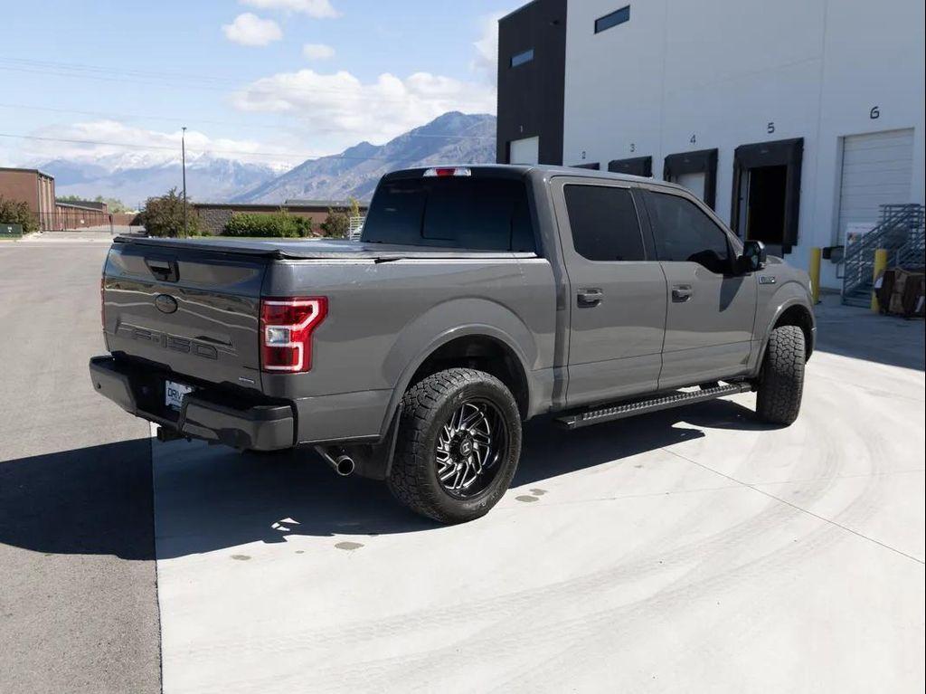 used 2018 Ford F-150 car, priced at $28,093