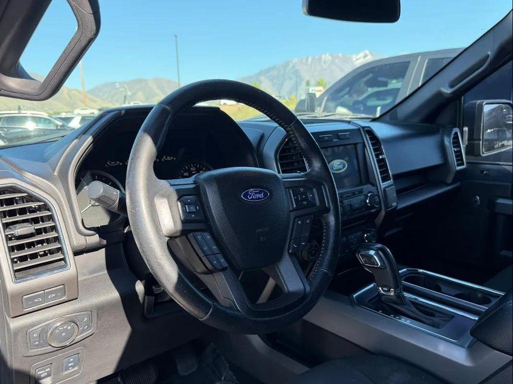 used 2018 Ford F-150 car, priced at $28,093