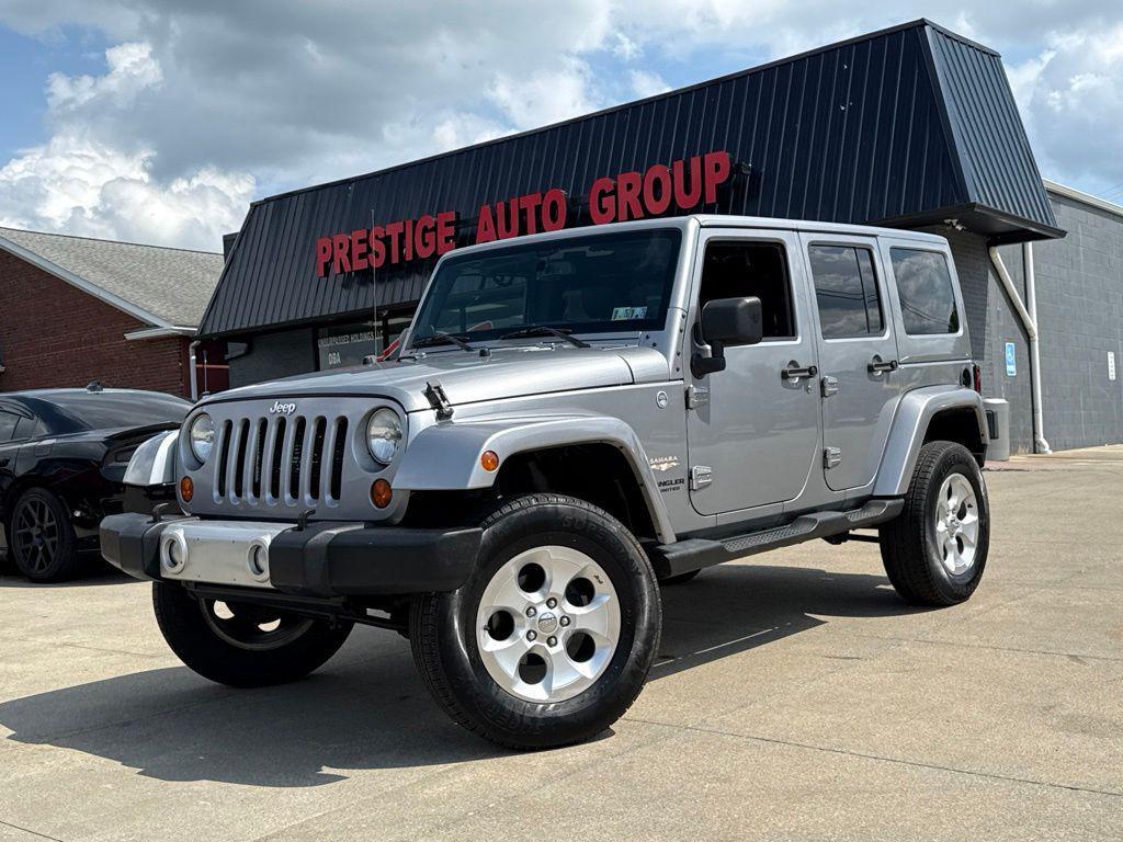 used 2013 Jeep Wrangler Unlimited car, priced at $13,485