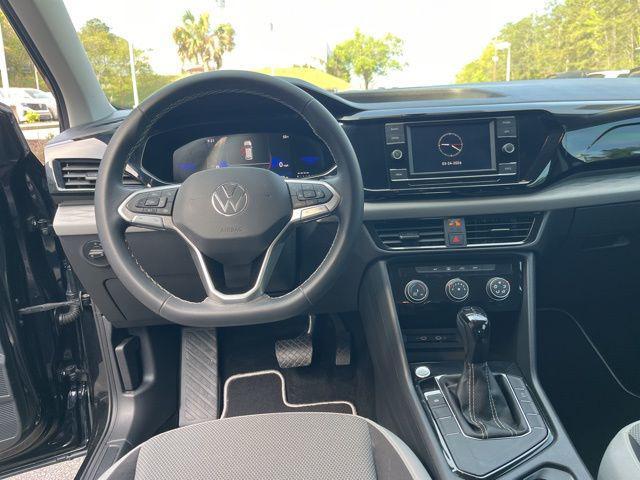 used 2023 Volkswagen Taos car, priced at $17,600