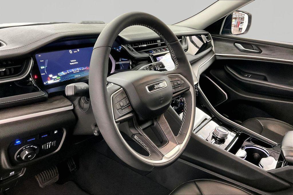 used 2023 Jeep Grand Cherokee 4xe car, priced at $27,553