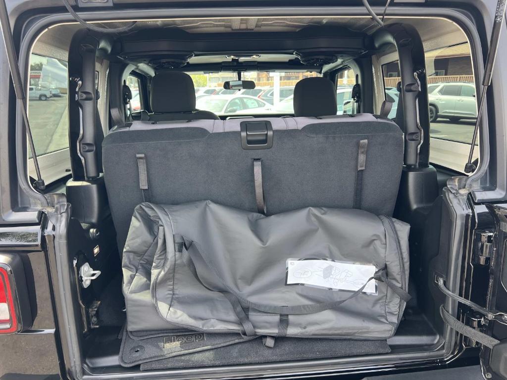 used 2023 Jeep Wrangler car, priced at $27,126