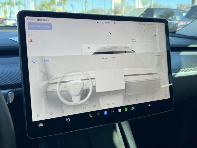 used 2024 Tesla Model Y car, priced at $31,999