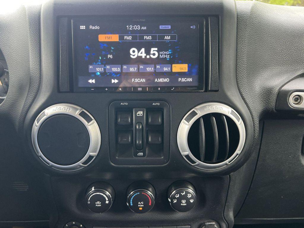 used 2016 Jeep Wrangler Unlimited car, priced at $19,976