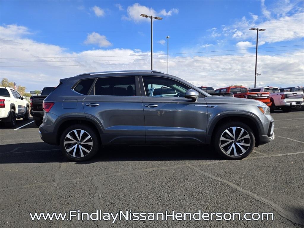 used 2023 Volkswagen Taos car, priced at $18,400