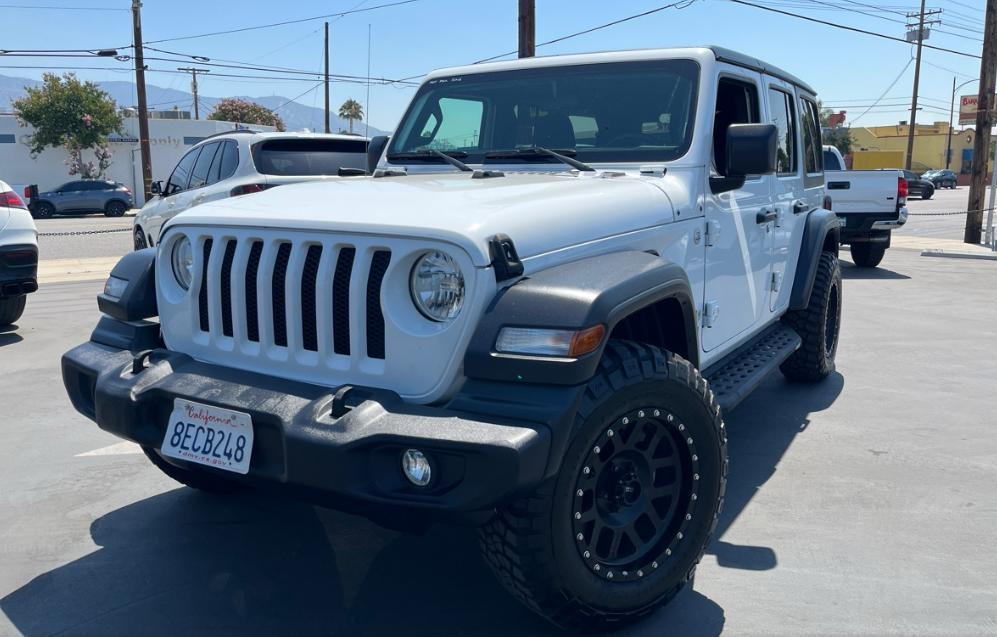 used 2018 Jeep Wrangler Unlimited car, priced at $24,483