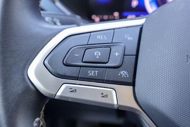 used 2024 Volkswagen Taos car, priced at $22,362
