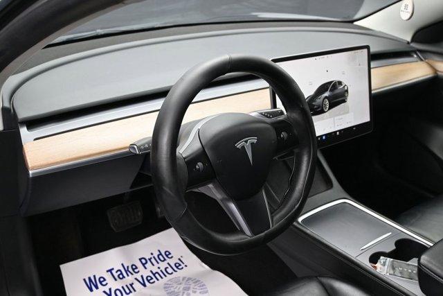 used 2023 Tesla Model 3 car, priced at $17,999