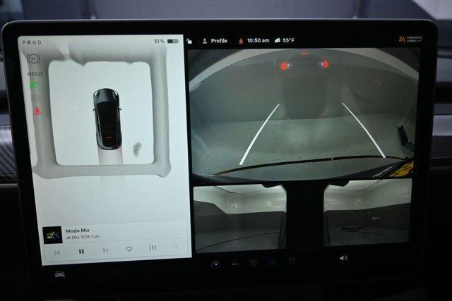used 2023 Tesla Model Y car, priced at $27,999