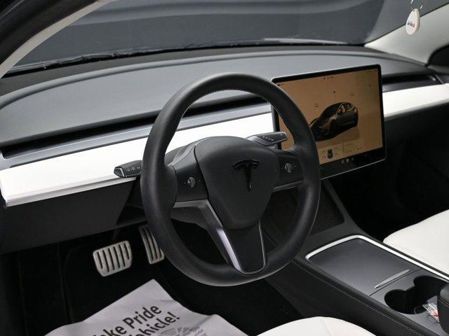 used 2023 Tesla Model 3 car, priced at $27,999