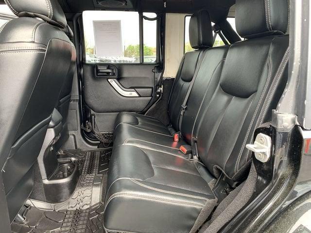 used 2013 Jeep Wrangler Unlimited car, priced at $16,499