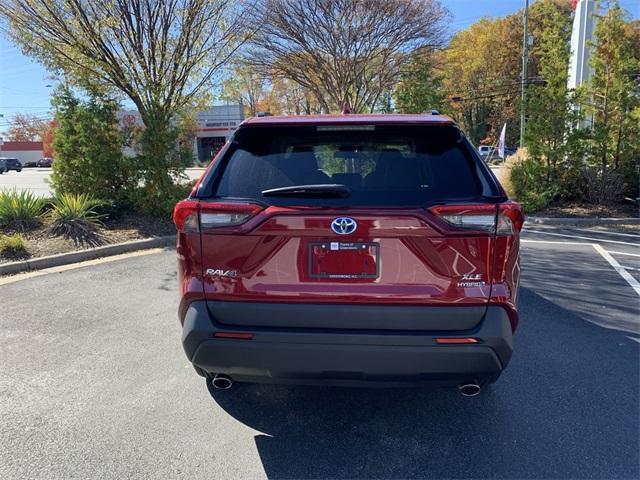used 2021 Toyota RAV4 Hybrid car, priced at $33,999