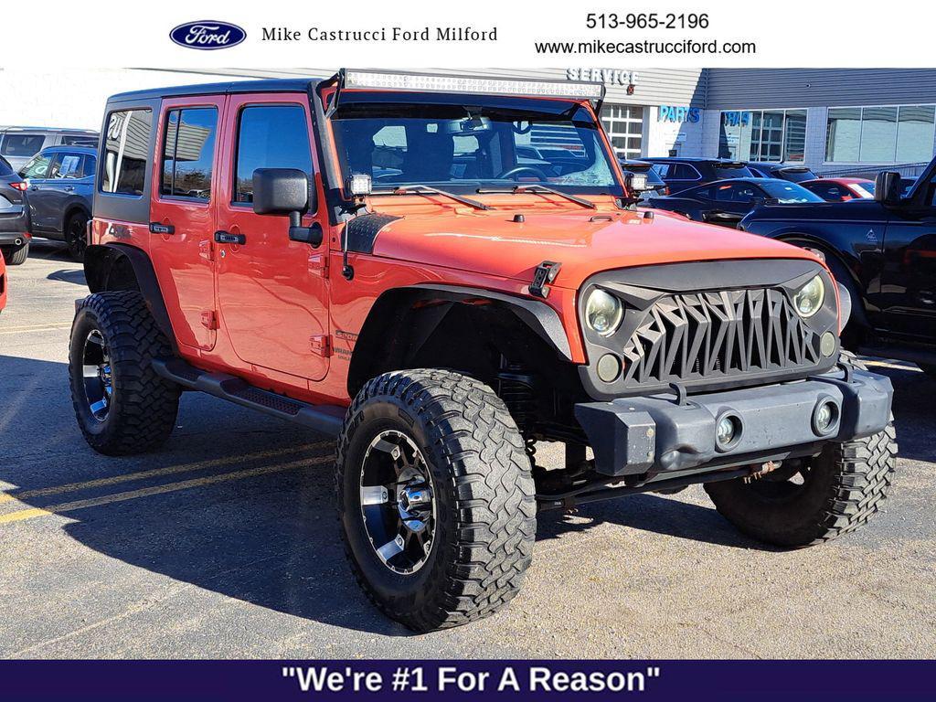 used 2013 Jeep Wrangler Unlimited car, priced at $12,450