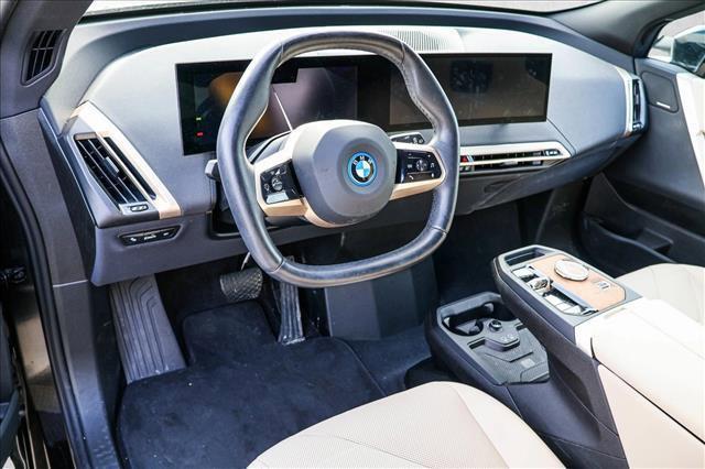 used 2024 BMW iX car, priced at $54,368