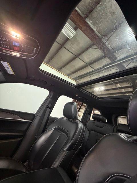 used 2024 Jeep Grand Cherokee 4xe car, priced at $28,252
