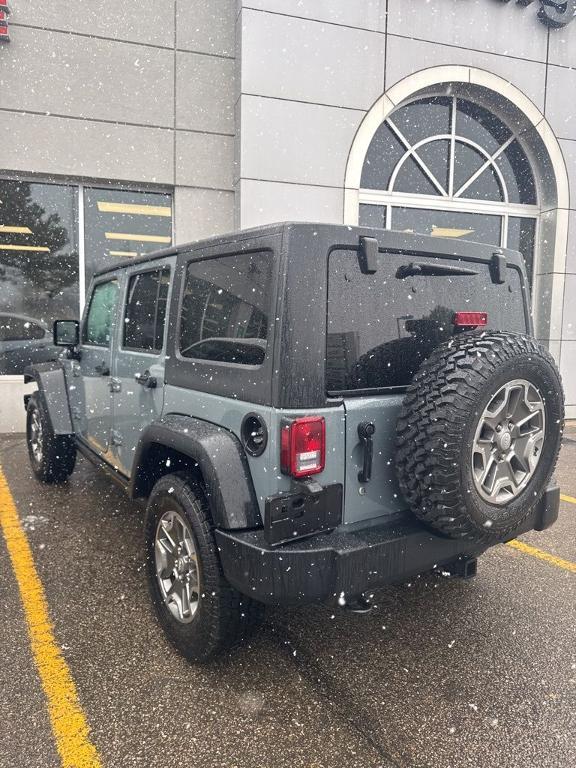 used 2014 Jeep Wrangler Unlimited car, priced at $16,801
